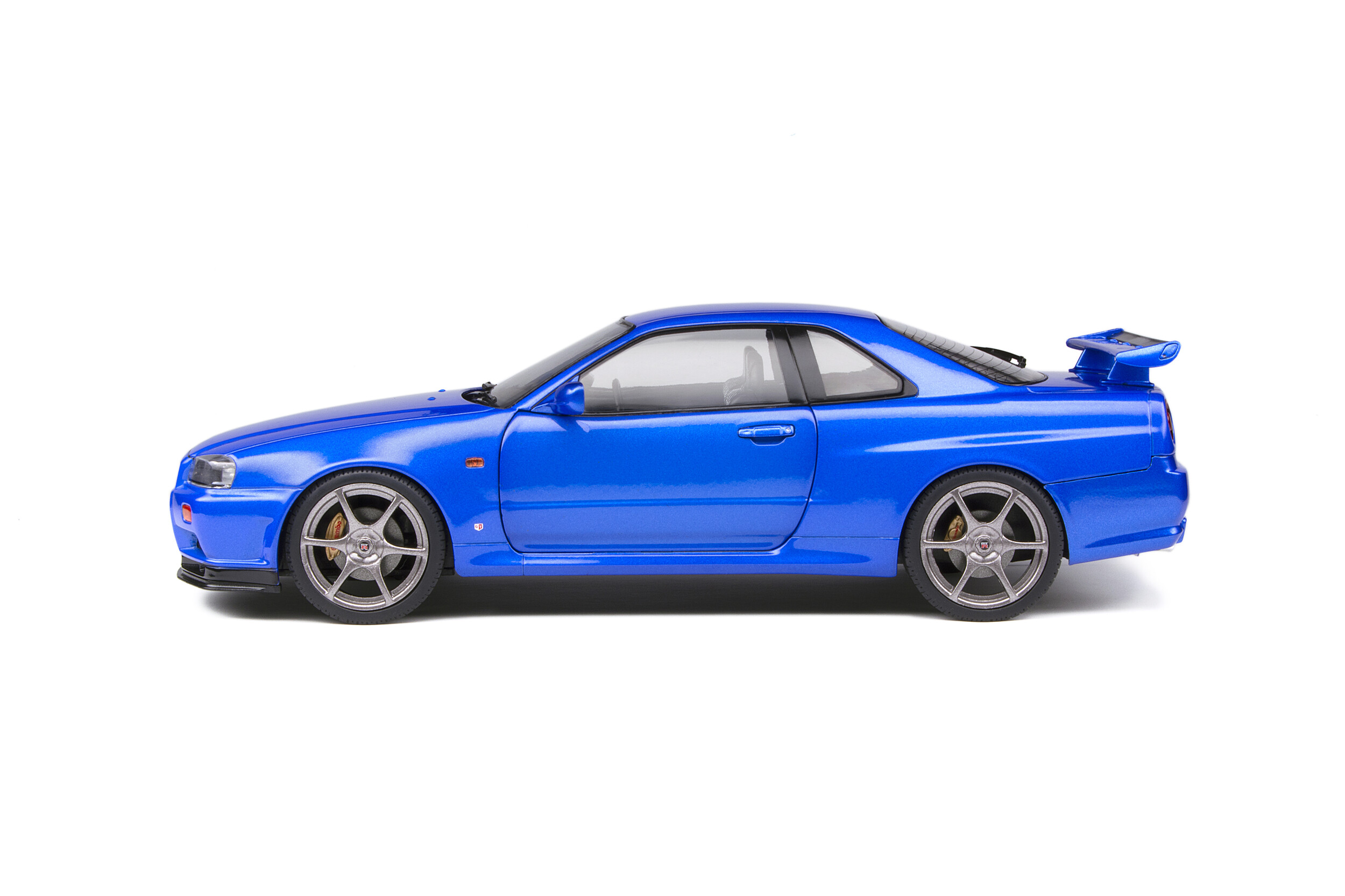  Solido Cars 1999 Nisan Skyline GT-R (R34) RHD (conducción a  mano derecha) Bayside Blue Metallic 1/18 Modelo de automóvil fundido a  presión por Solido S1804301 : Arte y Manualidades